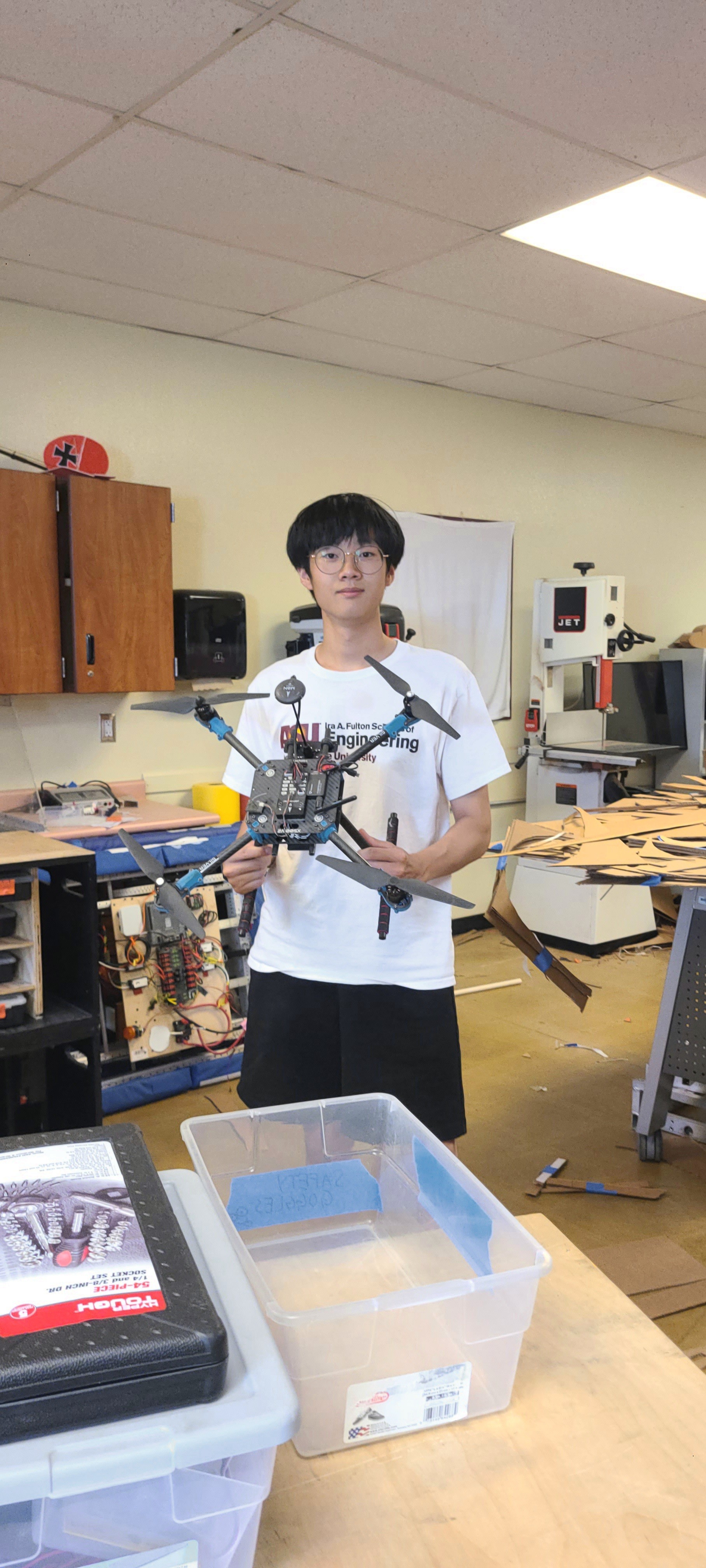 Brian holding a drone
